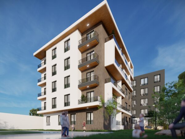 « Les Résidences » – Architecture contemporaine bicolore, balcons suspendus et jardin partagé sous ciel bleu (vue d’angle)